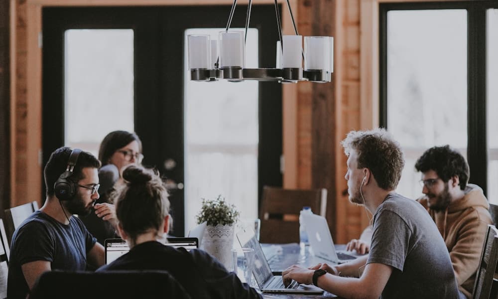 HR onboarding discussion with Thai SME owners - friendly employee support and consultation